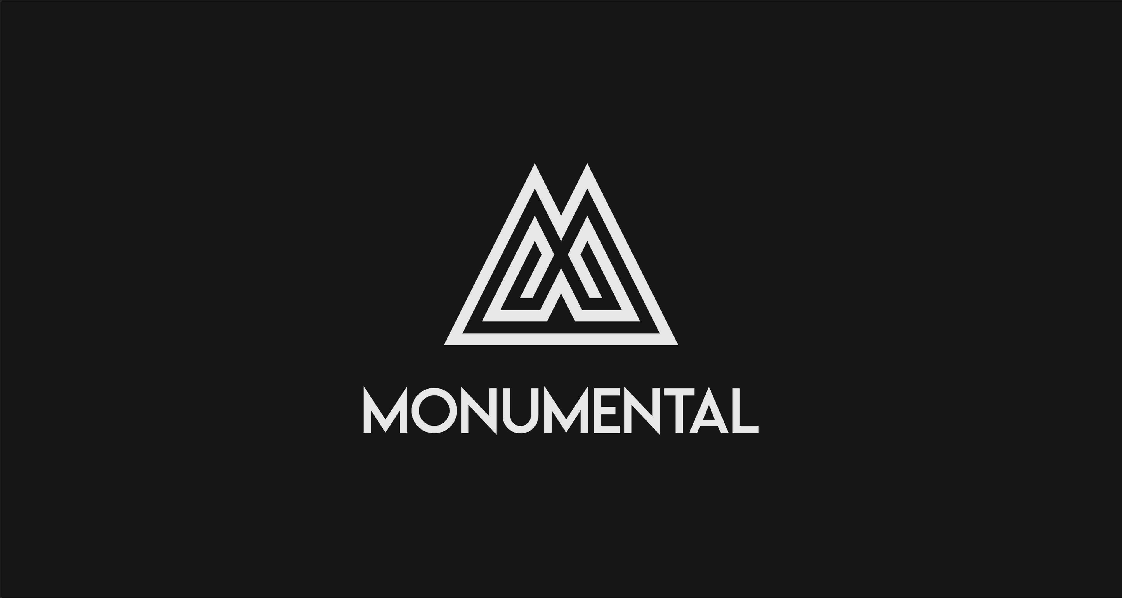 Monumental logo with a geometric mountain mark in white on black