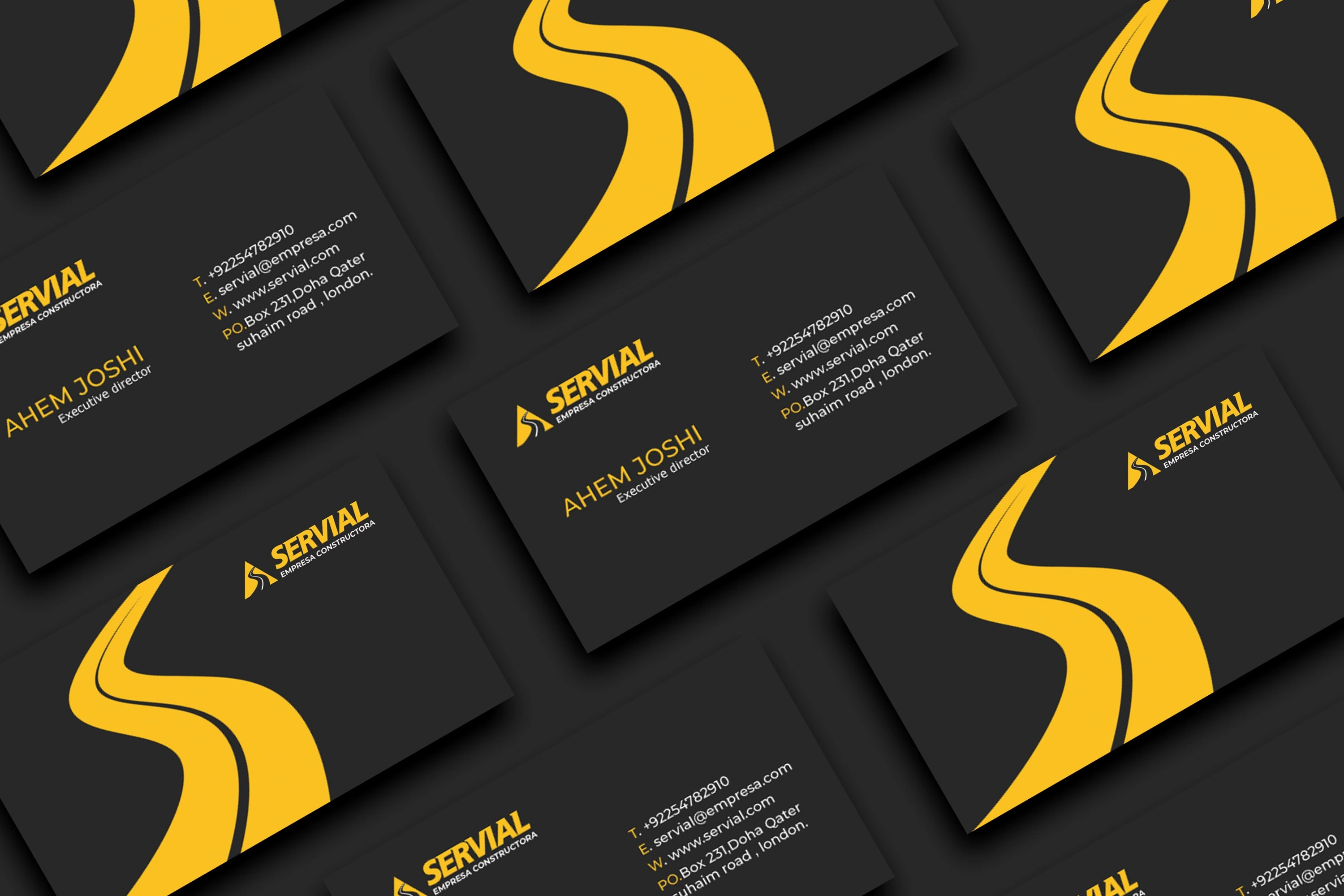 Servial business cards in charcoal and yellow with a road pattern