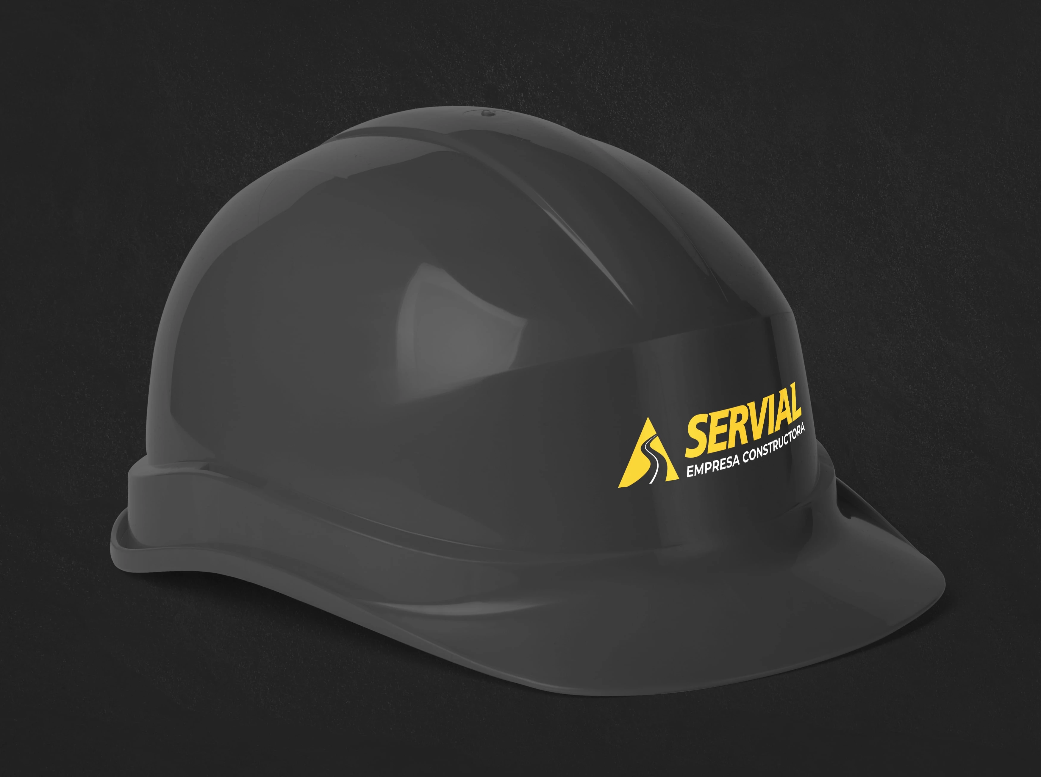 Black safety helmet with the Servial logo in yellow