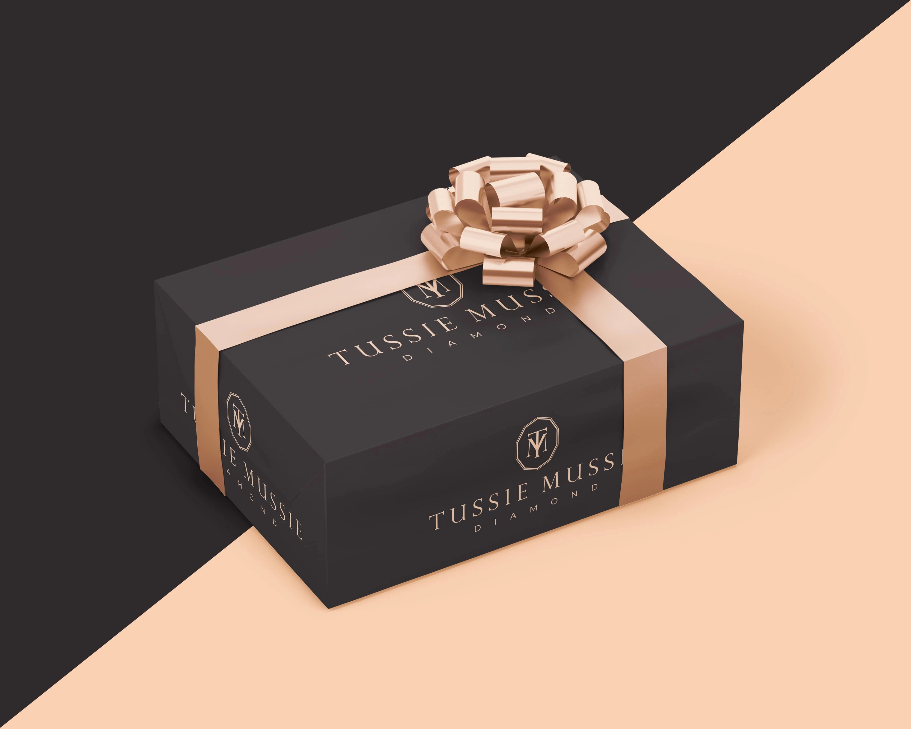 Tussie Mussie Diamond black gift box with a rose-gold ribbon and bow