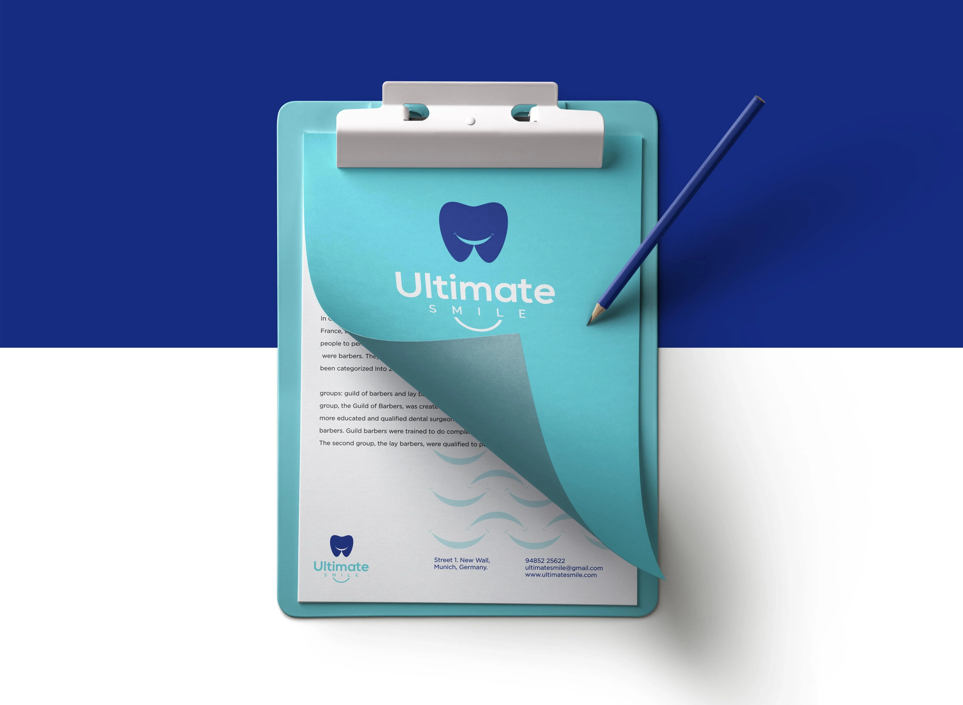 Ultimate Smile letterhead and clipboard stationery in navy and teal