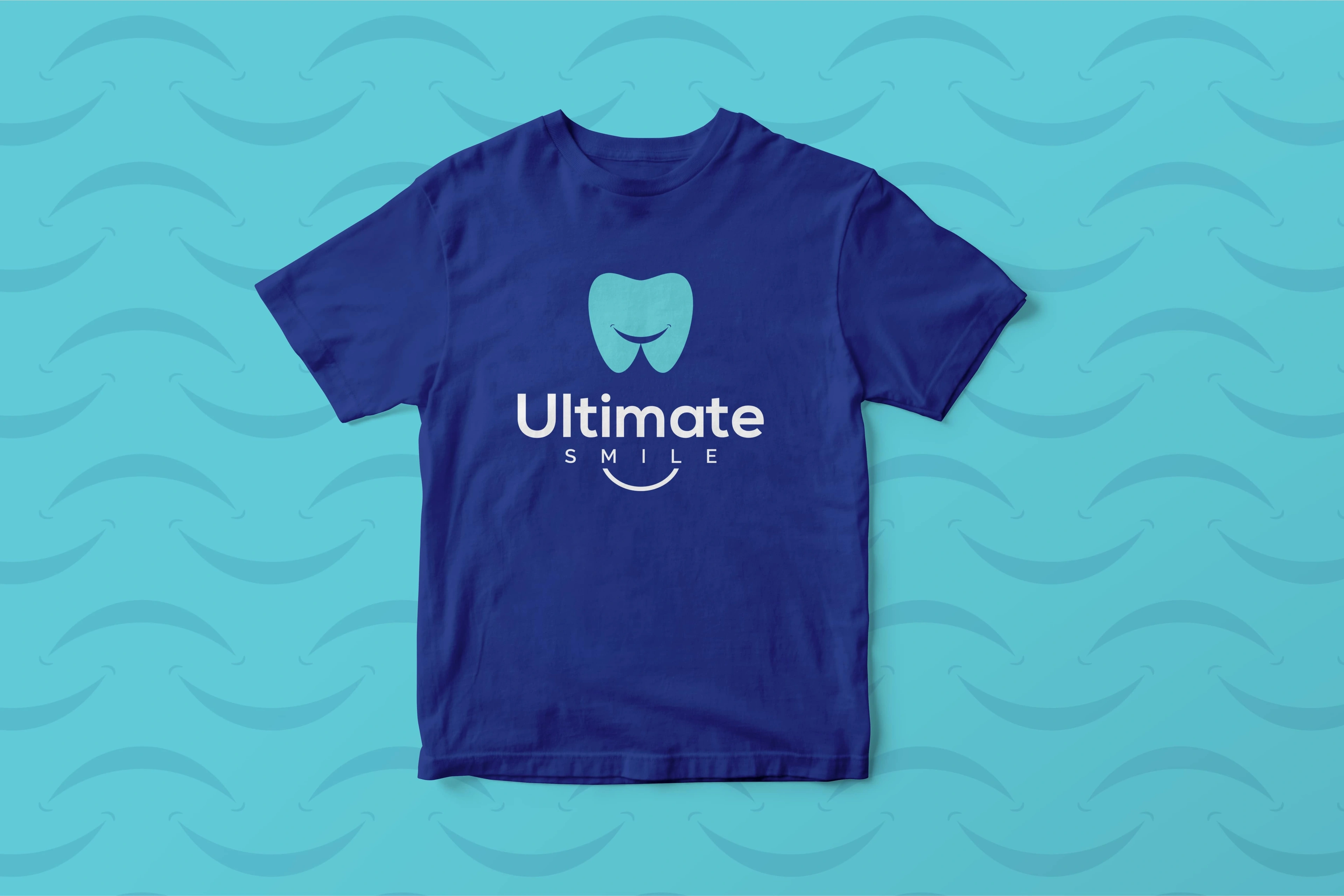 Ultimate Smile navy t-shirt with the logo on a teal wave pattern